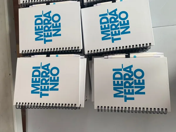 Detalle de libretas: muestra de trabajo de STAMPACOS
